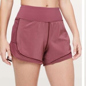 LULUEMON OVER & ABOVE TRAIN SHORT - SIZE 10 - MERLOT